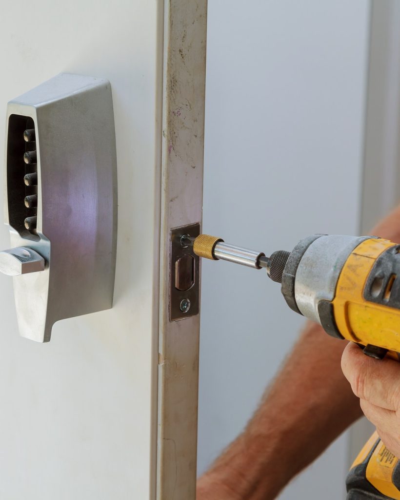man-installing-of-the-door-with-lock-key-security.jpg man-installing-of-the-door-with-lock-key-security.jpg